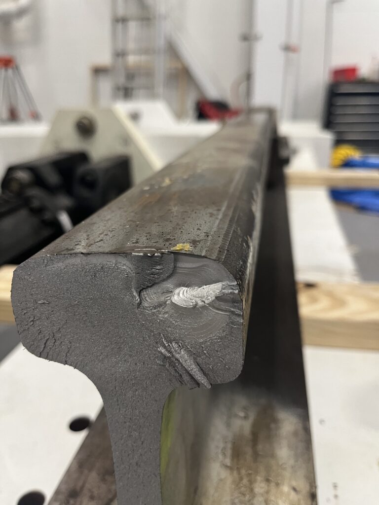 Photograph of a broken rail.